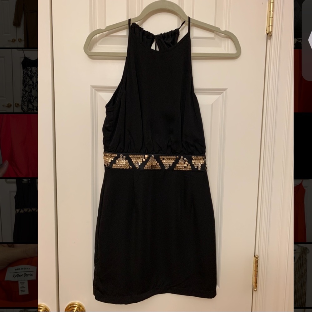 Halter mini dress with open back and sequin belt